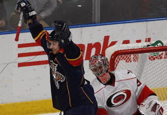 SUNRISE, FL - NOVEMBER 4: Steven Reinprecht #27 of the Florida Panthers celebrates after scoring a goal against Cam Ward #30 of the Carolina Hurricanes in the3 third period on November 4, 2009 at the BankAtlantic Center in Sunrise, Florida. The Panthers defeated the Hurricanes 3-0. (Photo by Joel Auerbach/Getty Images)