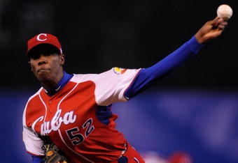 MEXICO CITY - MARCH 10:  Aroldis Chapman #52 of Cuba pitches against Australia during the first inning of the game during the 2009 World Baseball Classic Pool B match on March 10, 2009 at the Estadio Foro Sol in Mexico City, Mexico.  (Photo by Kevork Djansezian/Getty Images)