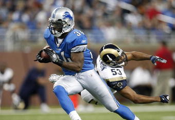 DETROIT , MI - NOVEMBER 01: Kevin Smith #34 of the Detroit Lions gets around Paris Lenon #53 of the St. Louis Rams on November 1, 2009 at Ford Field in Detroit, Michigan.  (Photo by Gregory Shamus/Getty Images)