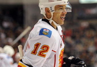 DALLAS - NOVEMBER 04:  Right wing Jarome Iginla #12 of the Calgary Flames celebrates his goal against the Dallas Stars at American Airlines Center on November 4, 2009 in Dallas, Texas.  (Photo by Ronald Martinez/Getty Images)