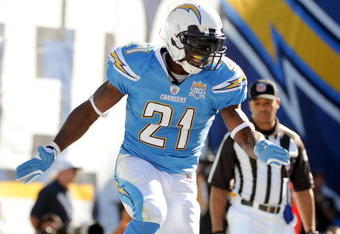 SAN DIEGO - NOVEMBER 01:  LaDainian Tomlinson #21 of the San Diego Chargers celebrates his second touchdown for a 21-7 lead over the Oakland Raiders during the second quarter at Qualcomm Stadium on November 1, 2009 in San Diego, California.  (Photo by Harry How/Getty Images)