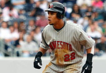 NEW YORK - MAY 17:  Carlos Gomez #22 of the Minnesota Twins runs against the New York Yankees on May 17, 2009 at Yankee Stadium in the Bronx borough of New York City. The Yankees defeated the Twins 3-2 in ten innings.  (Photo by Jim McIsaac/Getty Images)
