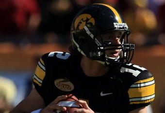 TAMPA, FL - JANUARY 01:  Ricky Stanzi #12 of the Iowa Hawkeyes drops back to pass against the South Carolina Gamecocks during the Outback Bowl on January 1, 2009 at Raymond James Stadium in Tampa, Florida.  (Photo by Scott Halleran/Getty Images)