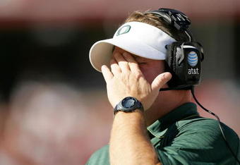 PALO ALTO, CA - NOVEMBER 07:  Oregon Ducks head coach Chip Kelly wipes his face during the first half of their game agains the the Stanford Cardinal at Stanford Stadium on November 7, 2009 in Palo Alto, California.  (Photo by Ezra Shaw/Getty Images)