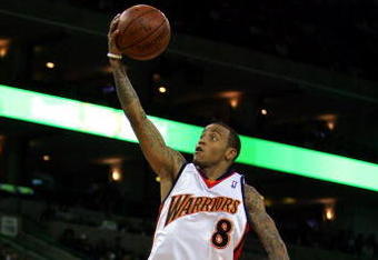 OAKLAND, CA - NOVEMBER 06:  Monta Ellis #8 of the Golden State Warriors drives to the basket during their game against the Los Angeles Clippers at Oracle Arena on November 6, 2009 in Oakland, California.  NOTE TO USER: User expressly acknowledges and agrees that, by downloading and/or using this Photograph, User is consenting to the terms and conditions of the Getty Images License Agreement.  (Photo by Ezra Shaw/Getty Images)