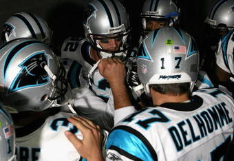 GLENDALE, AZ - NOVEMBER 01:  Gary Barnidge #82 and quarterback Jake Delhomme #17 of the Carolina Panthers huddle up before the NFL game against the Arizona Cardinals at the Universtity of Phoenix Stadium on November 1, 2009 in Glendale, Arizona. The Panthers defeated the Cardinals 34-21.  (Photo by Christian Petersen/Getty Images)