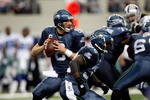 ARLINGTON, TX - NOVEMBER 01:  Quarterback Matt Hasselbeck #8 of the Seattle Seahawks drops back to pass against the Dallas Cowboys at Cowboys Stadium on November 1, 2009 in Arlington, Texas.  (Photo by Ronald Martinez/Getty Images)