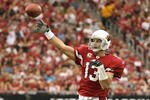 GLENDALE, AZ - NOVEMBER 01:  Quarterback Kurt Warner #13 of the Arizona Cardinals throws a pass during the NFL game against the Carolina Panthers at the Universtity of Phoenix Stadium on November 1, 2009 in Glendale, Arizona. The Panthers defeated the Cardinals 34-21.  (Photo by Christian Petersen/Getty Images)