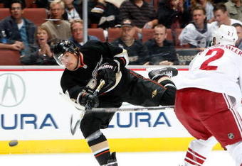 ANAHEIM, CA - NOVEMBER 07:  Teemu Selanne #8 of the Anaheim Ducks takes a shot in front of James Vandermeer #2 of the Phoenix Coyotes in the first period at the Honda Center on November 7, 2009 in Anaheim, California.  (Photo by Jeff Gross/Getty Images)