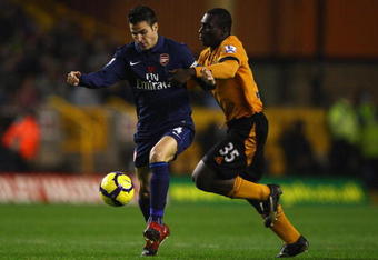 WOLVERHAMPTON, ENGLAND - NOVEMBER 07:   Segundo Castillo of Wolverhampton Wanderers battles for the ball with Cesc Fabregas of Arsenal during the Barclays Premier League match between Wolverhampton Wanderers and Arsenal at Molineux on November 7, 2009 in Wolverhampton, England. (Photo by Richard Heathcote/Getty Images)