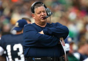 SOUTH BEND, IN - OCTOBER 03: Head coach Charlie Weis of the Notre Dame Fighting Irish watches as his team takes on the Washington Huskies on October 3, 2009 at Notre Dame Stadium in South Bend, Indiana.  Notre Dame defeated Washington 37-30 in overtime.  (Photo by Jonathan Daniel/Getty Images)