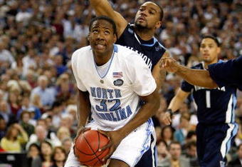 DETROIT - APRIL 04:  Ed Davis #32 of the North Carolina Tar Heels goes to shoot in front of Reggie Redding #15 of the Villanova Wildcats during the National Semifinal game of the NCAA Division I Men's Basketball Championship at Ford Field on April 4, 2009 in Detroit, Michigan.  (Photo by Streeter Lecka/Getty Images)