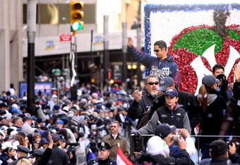 NEW YORK - NOVEMBER 06:  Jorge Posada # 20 of the New York Yankees celebrates on a float during the Yankees World Series Victory Parade on November 6, 2009 in New York City.  (Photo by Michael Loccisano/Getty Images)