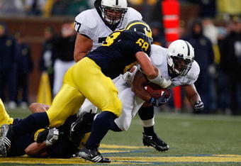 ANN ARBOR, MI - OCTOBER 24:  Mike Martin #68 of the Michigan Wolverines tackles Brandon Beachum #3 of the Penn State Nittany Lions on October 24, 2009 at Michigan Stadium in Ann Arbor, Michigan. (Photo by  Gregory Shamus/Getty Images)