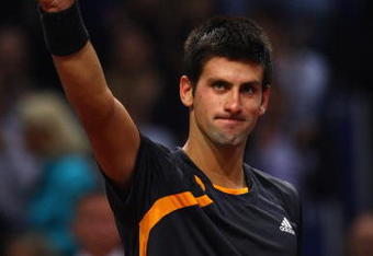 BASEL, SWITZERLAND - NOVEMBER 08:  Novak Djokovic of Serbia celebrates at match point after defeating Roger Federer of Switzerland in the final during Day Seven of the Davidoff Swiss Indoors Tennis at St Jakobshalle on November 8, 2009 in Basel, Switzerland.  (Photo by Julian Finney/Getty Images)