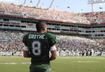 TAMPA, FL - OCTOBER 13: Quarterback Matt Grothe #8 of the University of South Florida Bulls checks the field during play against the University of Central Florida Knights at Raymond James Stadium on October 13, 2007 in Tampa, Florida. The Bulls won 64 - 12. (Photo by Al Messerschmidt/Getty Images)