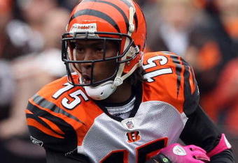 CLEVELAND - OCTOBER 04:  Chris Henry #15 of the Cincinnati Bengals runs the ball against the Cleveland Browns during their game at Cleveland Browns Stadium on October 4, 2009 in Cleveland, Ohio. The Bengals defeated the Browns 23-20 in overtime.  (Photo by Jim McIsaac/Getty Images)
