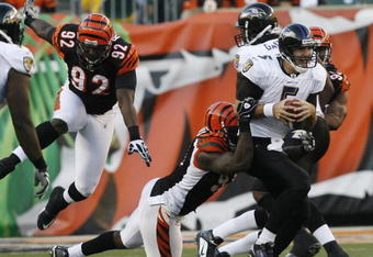 CINCINNATI - NOVEMBER 8: Carson Palmer #9 of the Cincinnati Bengals throws under pressure from the Baltimore Ravens at Paul Brown Stadium on November 8, 2009 in Cincinnati, Ohio.  (Photo by John Sommers II/Getty Images)