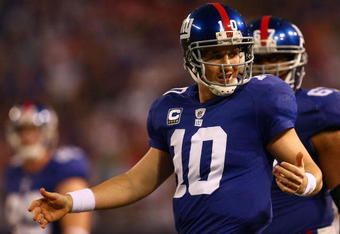 EAST RUTHERFORD, NJ - NOVEMBER 08:  Eli Manning # 10 of the New York Giants appeals a referee's decision in NFL action against the San Diego Chargers on November 8, 2009 at Giants Stadium in East Rutherford, New Jersey.  (Photo by Chris McGrath/Getty Images)
