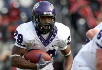 SAN DIEGO - NOVEMBER 07:  Running back Matthew Tucker #29 of the Texas Christian University Horned Frogs carries the ball at the start of a 30 yard touchdown run in the third quarter against the San Diego State Aztecs on November 7, 2009 at Qualcomm Stadium in San Diego, California.   TCU won 55-12.  (Photo by Stephen Dunn/Getty Images)