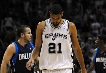 SAN ANTONIO - APRIL 28:   Forward Tim Duncan #21 of the San Antonio Spurs reacts during a 106-93 loss against the Dallas Mavericks in Game Five of the Western Conference Quarterfinals during the 2009 NBA Playoffs at AT&T Center on April 28, 2009 in San Antonio, Texas. NOTE TO USER: User expressly acknowledges and agrees that, by downloading and or using this photograph, User is consenting to the terms and conditions of the Getty Images License Agreement.  (Photo by Ronald Martinez/Getty Images)