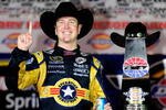 FORT WORTH, TX - NOVEMBER 08:  Kurt Busch, driver of the #2 Miller Lite Dodge, poses with the trophy on victory lane after winning the NASCAR Sprint Cup Series Dickies 500 at Texas Motor Speedway on November 8, 2009 in Fort Worth, Texas.  (Photo by Rusty Jarrett/Getty Images for NASCAR)