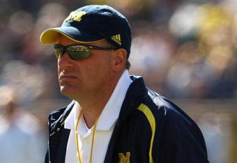 ANN ARBOR, MI - SEPTEMBER 19:  Head coach Rich Rodriguez of the Michigan Wolverines watches warmups before the game with the Eastern Michigan Eagles at Michigan Stadium on September 19, 2009 in Ann Arbor, Michigan.  Michigan won 45-17.  (Photo by Stephen Dunn/Getty Images)