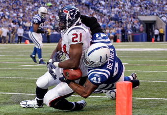 INDIANAPOLIS - NOVEMBER 08:  Antoine Bethea #41 of the Indianapolis Colts causes a fumble as he tackles Ryan Moats #21 of the Houston Texans during the NFL game at Lucas Oil Stadium on November 8, 2009 in Indianapolis, Indiana. The Colts won 20-17.  (Photo by Andy Lyons/Getty Images)