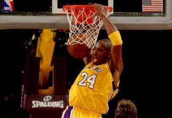 LOS ANGELES - NOVEMBER 6:  Kobe Bryant #24 of the Los Angeles Lakers dunks over Marc Gasol #33 and Rudy Gay #22 of the Memphis Grizzlies on November 6, 2009 at Staples Center in Los Angeles, California.  The Lakers won 114-98.  NOTE TO USER: User expressly acknowledges and agrees that, by downloading and/or using this Photograph, user is consenting to the terms and conditions of the Getty Images License Agreement. (Photo by Stephen Dunn/Getty Images)