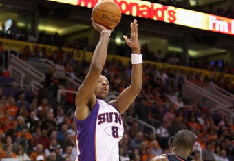 PHOENIX - OCTOBER 30:  Channing Frye #8 of the Phoenix Suns puts up a shot during the NBA game against the Golden State Warriors at US Airways Center on October 30, 2009 in Phoenix, Arizona.  The Suns defeated the Warriors 123-101.   NOTE TO USER: User expressly acknowledges and agrees that, by downloading and or using this photograph, User is consenting to the terms and conditions of the Getty Images License Agreement.  (Photo by Christian Petersen/Getty Images)