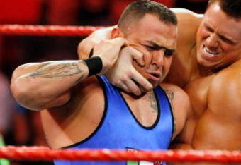 LAS VEGAS - AUGUST 24:  Wrestlers Santino Marella (L) and The Miz compete during the WWE Monday Night Raw show at the Thomas & Mack Center August 24, 2009 in Las Vegas, Nevada.  (Photo by Ethan Miller/Getty Images)