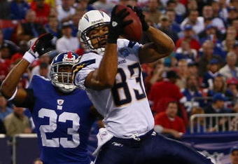EAST RUTHERFORD, NJ - NOVEMBER 08:  Vincent Jackson #83 of the San Diego Chargers makes a touchdown catch under pressure from Corey Webster #23 of the the New York Giants on November 8, 2009 at Giants Stadium in East Rutherford, New Jersey.  (Photo by Chris McGrath/Getty Images)