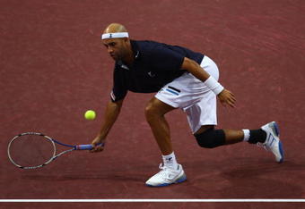 BASEL, SWITZERLAND - NOVEMBER 04:  James Blake of USA plays a volley in his match against Jeremy Chardy of France during Day Three of the Davidoff Swiss Indoors Tennis at St Jakobshalle on November 4, 2009 in Basel, Switzerland.  (Photo by Julian Finney/Getty Images)