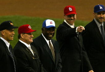 SAN FRANCISCO - OCTOBER 23: (L-R)  Cal Ripken Jr., Pete Rose, Hank Aaron, Mark McGwire and Kirk Gibson stand together during the MLB Ten Most Memorable Moments ceremony before the start of game four of the World Series between the San Francisco Giants and the Anaheim Angels on October 23, 2002 at Pacific Bell Park in San Francisco, California. Cal Ripken Jr. was voted number one. (Photo by Brian Bahr/Getty Images) 