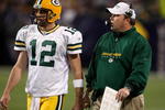 MINNEAPOLIS - NOVEMBER 09:  Quarterback Aaron Rodgers #12 and head coach Mike McCarthy of the Green Bay Packers confer against the Minnesota Vikings on November 9, 2008 at the Metrodome in Mineapolis, Minnesota.  The Vikings won 28-27.  (Photo by Stephen Dunn/Getty Images)
