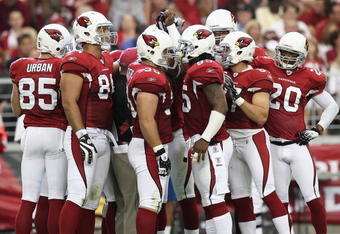 GLENDALE, AZ - NOVEMBER 01:  The Arizona Cardinals huddle up during the NFL game against the Carolina Panthers at the Universtity of Phoenix Stadium on November 1, 2009 in Glendale, Arizona. The Panthers defeated the Cardinals 34-21.  (Photo by Christian Petersen/Getty Images)