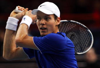 PARIS - NOVEMBER 09:  Tomas Berdych of the Czech Republic in action during his match against Vincent Millot of France during the ATP Masters Series at the Palais Omnisports De Paris-Bercy on November 9, 2009 in Paris, France.  (Photo by Clive Rose/Getty Images)