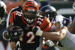 CINCINNATI - NOVEMBER 8: Cedric Benson #32 of the Cincinnati Bengals is tackled by Kelly Gregg #97 of the Baltimore Ravens at Paul Brown Stadium on November 8, 2009 in Cincinnati, Ohio.  (Photo by John Sommers II/Getty Images)