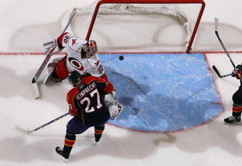 SUNRISE, FL - NOVEMBER 4: Steven Reinprecht #27 of the Florida Panthers scores a goal past goaltender Cam Ward #30 of the Carolina Hurricanes in the third period on November 4, 2009 at the BankAtlantic Center in Sunrise, Florida. The Panthers defeated the Hurricanes 3-0. (Photo by Joel Auerbach/Getty Images)
