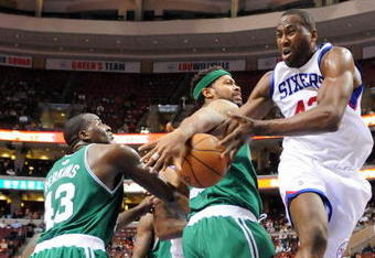PHILADELPHIA - NOVEMBER 03:  Elton Brand #42 of the Philadelphia 76ers is fouled as he goes to the basket by Rasheed Wallace #30 of the Boston Celtics at the Wachovia Center on November 3, 2009 in Philadelphia, Pennsylvania.  NOTE TO USER: User expressly acknowledges and agrees that, by downloading and or using this photograph, User is consenting to the terms and conditions of the Getty Images License Agreement.  (Photo by Chris Chambers/Getty Images)