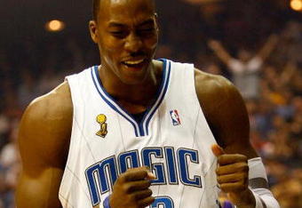 ORLANDO, FL - JUNE 11: Dwight Howard #12 of the Orlando Magic reacts in the first quarter of Game Four of the 2009 NBA Finals against the Los Angeles Lakers on June 11, 2009 at Amway Arena in Orlando, Florida.  NOTE TO USER:  User expressly acknowledges and agrees that, by downloading and or using this photograph, User is consenting to the terms and conditions of the Getty Images License Agreement.  (Photo by Chris Graythen/Getty Images)