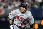 NEW YORK - OCTOBER 09:  Carlos Gomez #22 of the Minnesota Twins runs against the New York Yankees in Game Two of the ALDS during the 2009 MLB Playoffs at Yankee Stadium on October 9, 2009 in the Bronx borough of New York City.  (Photo by Jim McIsaac/Getty Images)