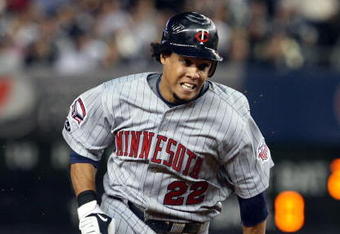 NEW YORK - OCTOBER 09:  Carlos Gomez #22 of the Minnesota Twins runs against the New York Yankees in Game Two of the ALDS during the 2009 MLB Playoffs at Yankee Stadium on October 9, 2009 in the Bronx borough of New York City.  (Photo by Jim McIsaac/Getty Images)