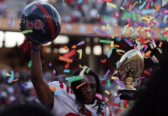 DALLAS - JANUARY 02:  Dexter McCluster #22 of the Mississippi Rebels celebrates a 47-34 win against the Texas Tech Red Raiders during the AT&T Cotton Bowl on January 2, 2009 at the Cotton Bowl in Dallas, Texas.  (Photo by Ronald Martinez/Getty Images)
