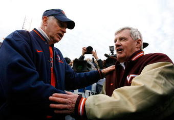 CHARLOTTESVILLE, VA - NOVEMBER 24:  Head coach Al Groh (L) of the Virginia Cavaliers congratulates head coach Frank Beamer of the Virginia Tech Hokies after after the Hokies 33-21 win at Scott Stadium on November 24, 2007 in Charlottesville, Virginia.  (Photo by Kevin C. Cox/Getty Images)