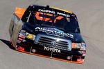 FORT WORTH, TX - NOVEMBER 05:  Brian Scott, driver of the #16 Albertson's Toyota, drives during practice for the NASCAR Camping World Truck Series WinStar World Casino 350 at Texas Motor Speedway on November 5, 2009 in Fort Worth, Texas.  (Photo by Geoff Burke/Getty Images for NASCAR)
