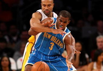 LOS ANGELES - NOVEMBER 8: Chris Paul #3 of the New Orleans Hornets tries to catch a pass as Derek Fisher #3 of the Los Angeles Lakers defends on November 8, 2009 at Staples Center in Los Angeles, California. The Lakers won 104-88.  NOTE TO USER: User expressly acknowledges and agrees that, by downloading and/or using this Photograph, user is consenting to the terms and conditions of the Getty Images License Agreement.   (Photo by Stephen Dunn/Getty Images)