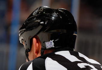 ATLANTA - OCTOBER 29:  Referee Brad Meier #34 wears a Hockey Fights Cancer sticker on his helmet during the game between of the Washington Capitals the Atlanta Thrashers at Philips Arena on October 29, 2009 in Atlanta, Georgia.  (Photo by Kevin C. Cox/Getty Images)
