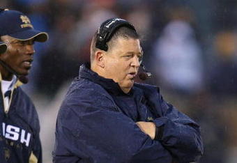 SOUTH BEND, IN - OCTOBER 03: Head coach Charlie Weis of the Notre Dame Fighting Irish watches as his team takes on the Washington Huskies on October 3, 2009 at Notre Dame Stadium in South Bend, Indiana.  Notre Dame defeated Washington 37-30 in overtime. (Photo by Jonathan Daniel/Getty Images)