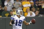 GREEN BAY - SEPTEMBER 21:  Miles Austin #19 of the Dallas Cowboys celebrates his touchdown against the Green  Bay Packers at Lambeau Field on September 21, 2008 in Green Bay, Wisconsin. The Cowboys defeated the Packers in 27- 16.  (Photo by Tom Hauck/Getty Images)